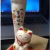 Mèo tay dài cầu chúc tiền tài và hạnh phúc