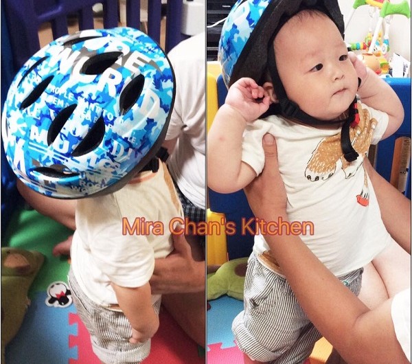 Tập cho em đội nón bảo hiểm