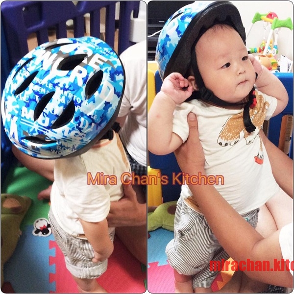 Tập cho em đội nón bảo hiểm